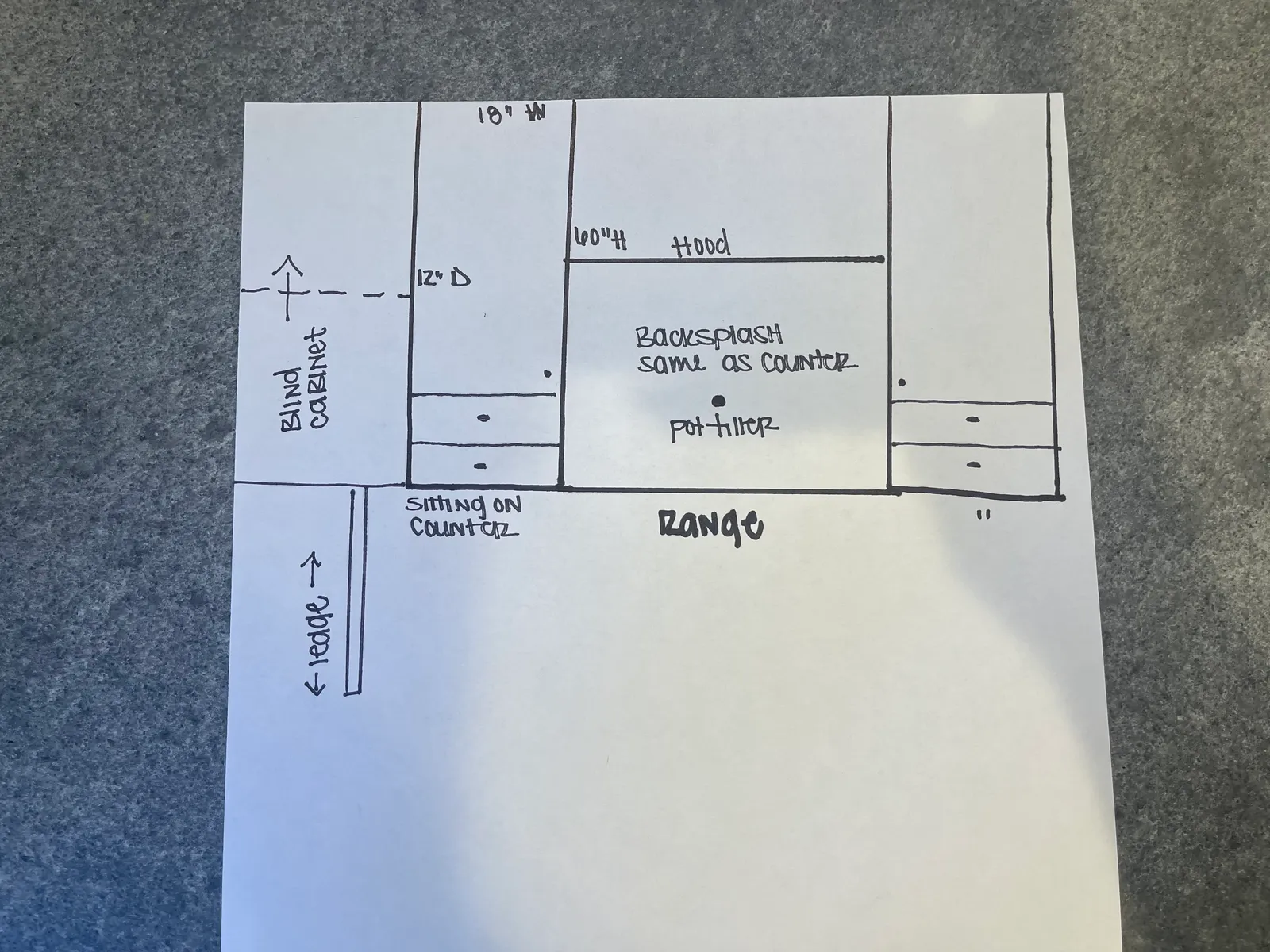 Hand-drawn range wall cabinetry elevation with hood and pot filler